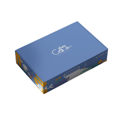 A rectangular blue product box with white script branding on the top and colorful illustrated side panels, shown on a plain white background.