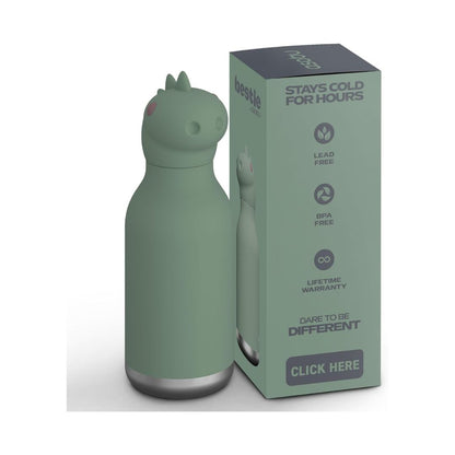 A sage green bottle-shaped container with a small animal head design on top, shown next to its matching sage green retail box on a light gray background.