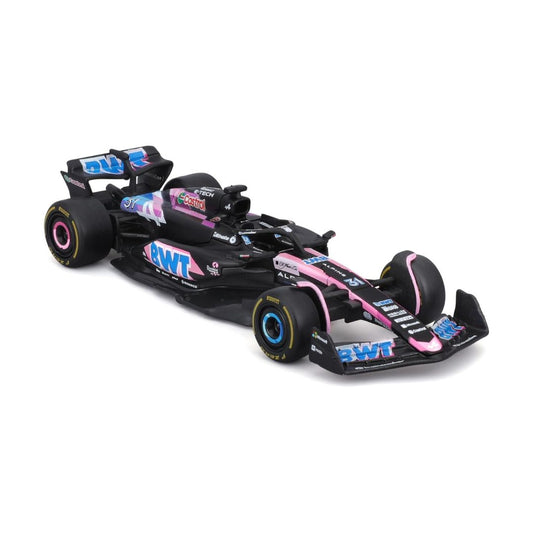 A scale model of a black and pink RWT Formula 1 car, featuring blue and white sponsor decals, displayed on a clean white background.