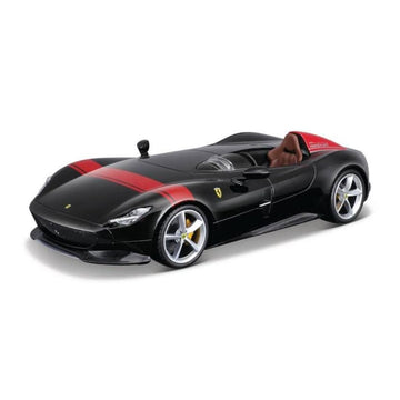 A black diecast model of a Ferrari sports car with red stripes and a brown interior, shown on a clean white background.