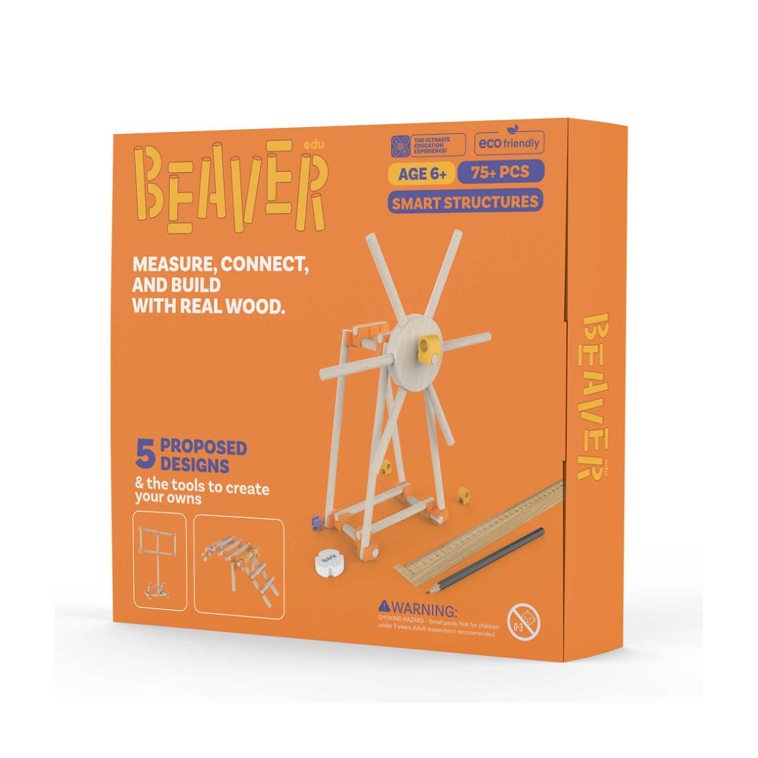 Beaver Smart Structures wooden model building kit in an orange box, showing a windmill model and text about measuring, connecting, and building with real wood.