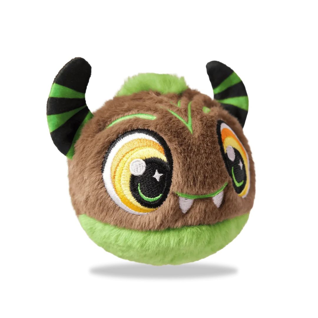A round plush monster toy with brown fur, bright green accents, and large embroidered eyes, shown on a clean white background.