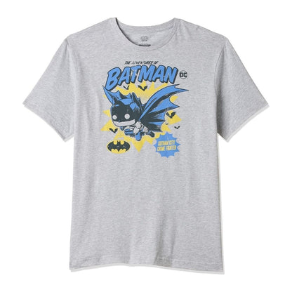 A heather gray short-sleeve t-shirt featuring a colorful graphic of a cartoon Batman flying, with 'BATMAN' printed in blue above and a DC logo on the chest.