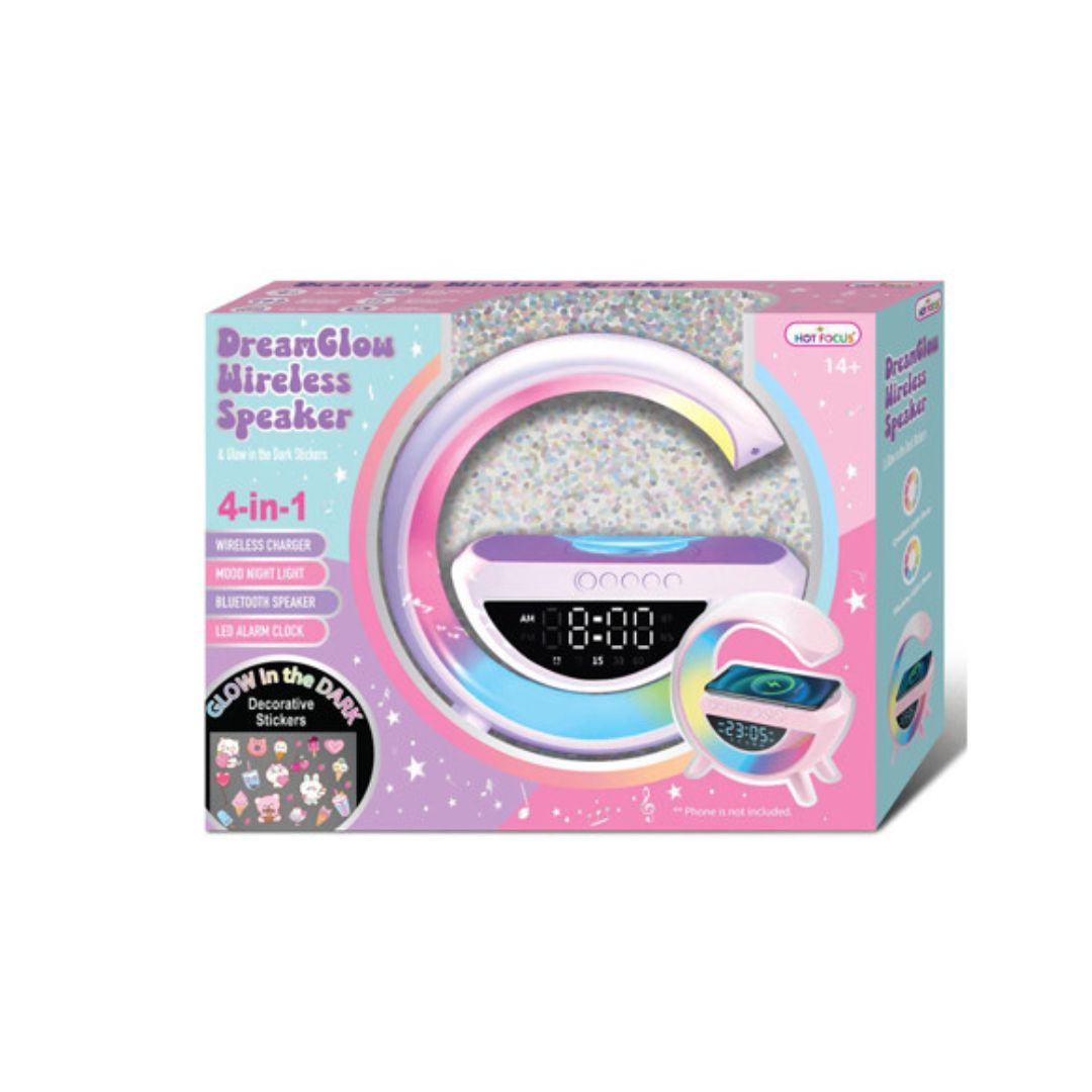 Dreamglow Wireless Speaker 4-in-1 toy set in its retail packaging, featuring a pastel pink and purple box with a graphic of the glowing speaker and a sticker pack insert.