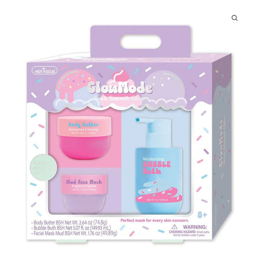 Hot Focus Glow Mode makeup set in a pastel purple and pink box, containing a body butter jar, a mud face mask jar, and a double bath bottle.
