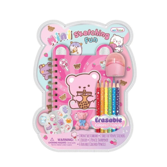 A children's mini sketching kit in a teddy bear-shaped packaging, featuring a pink bear-themed notebook, colored pencils, a pink eraser, stickers, and a small erasable colored pencil, on a plain white background.