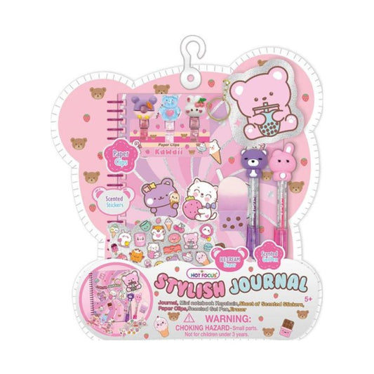 Shop the Hot Focus Stylish Journal Set! Includes spiral journal, mini notebook keychain, scented gel pens, paper clips, stickers, and eraser for ages 5+.