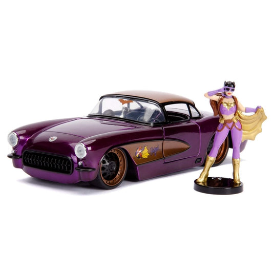A purple classic Corvette die-cast model car with a brown roof and side panels, shown alongside a small purple-and-gold superhero figurine on a black base. The car has a purple-to-brown gradient finish and a small graphic decal on the side.