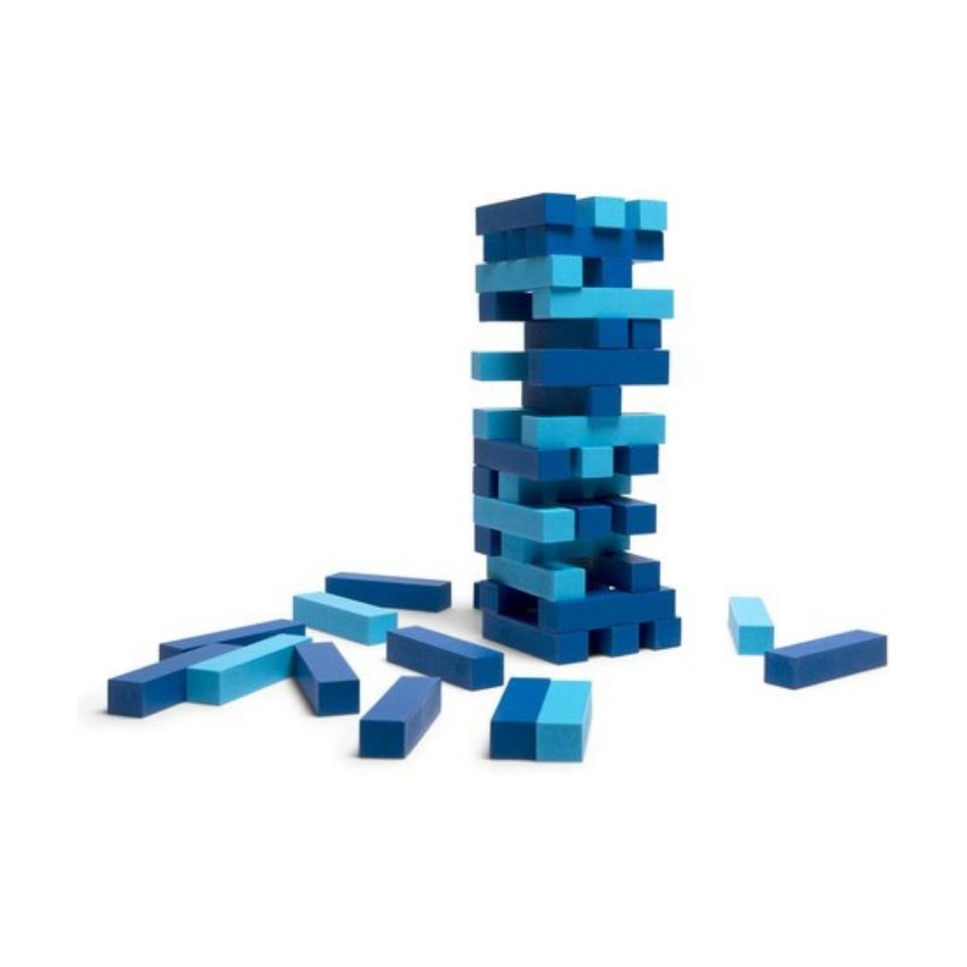 A set of blue wooden stacking blocks arranged with one tall tower and several scattered pieces on a plain white background.