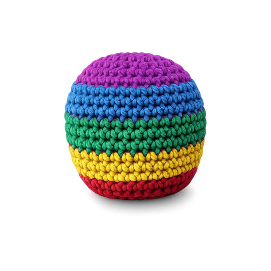 A round, hand-crocheted pouf or ottoman featuring horizontal rainbow stripes of purple, blue, green, yellow, and red on a white background.