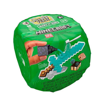 A green Minecraft Make It Mini toy container with a printed hand holding a block, shown on a plain white background.