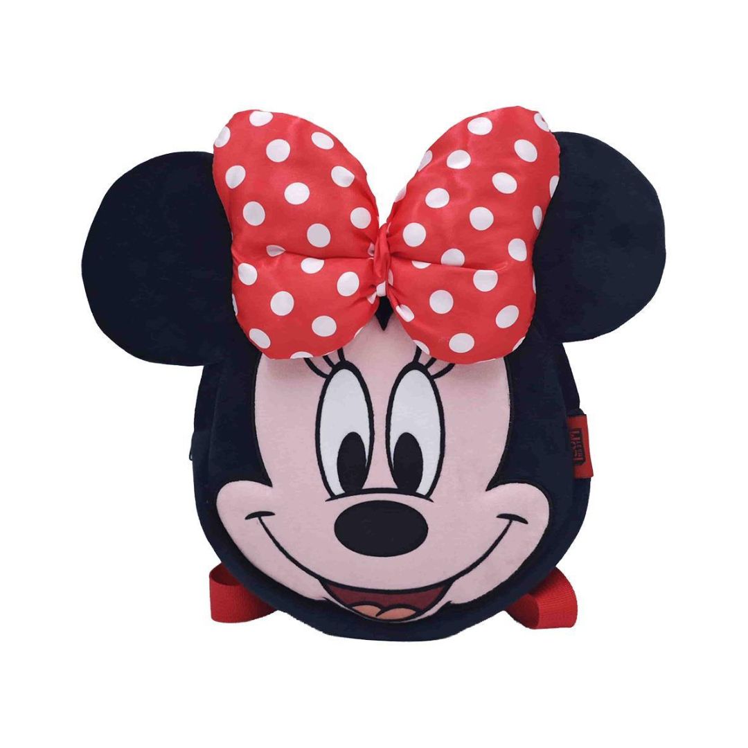 A plush Minnie Mouse face backpack featuring a large red bow with white polka dots, black mouse ears, and a pink face on a white background.