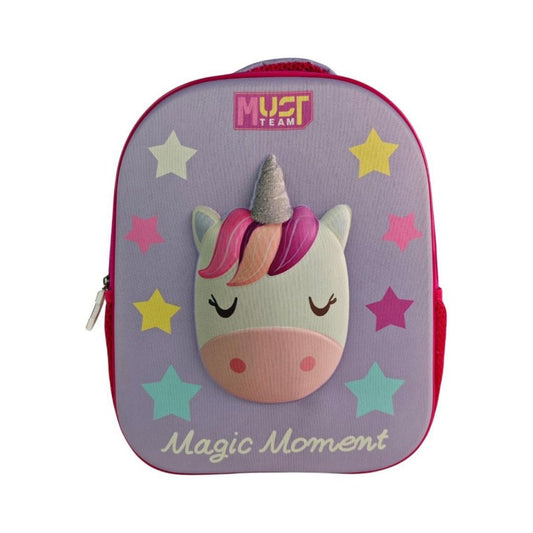 A lavender purple kids' backpack featuring a 3D unicorn face on the front, surrounded by colorful star accents. The top has a pink 'MUST TEAM' logo patch, and the bottom features the text 'Magic Moment' in white script.