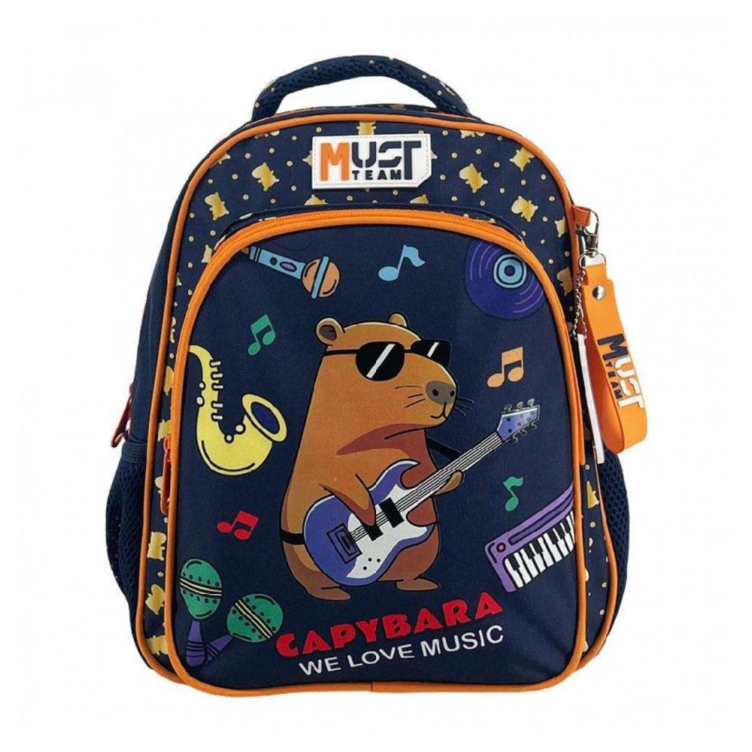 A navy blue school backpack featuring a cartoon capybara playing a blue electric guitar, surrounded by musical notes, instruments, and stars. The backpack has orange trim, a top handle, a front zippered pocket, and a hanging orange keychain.