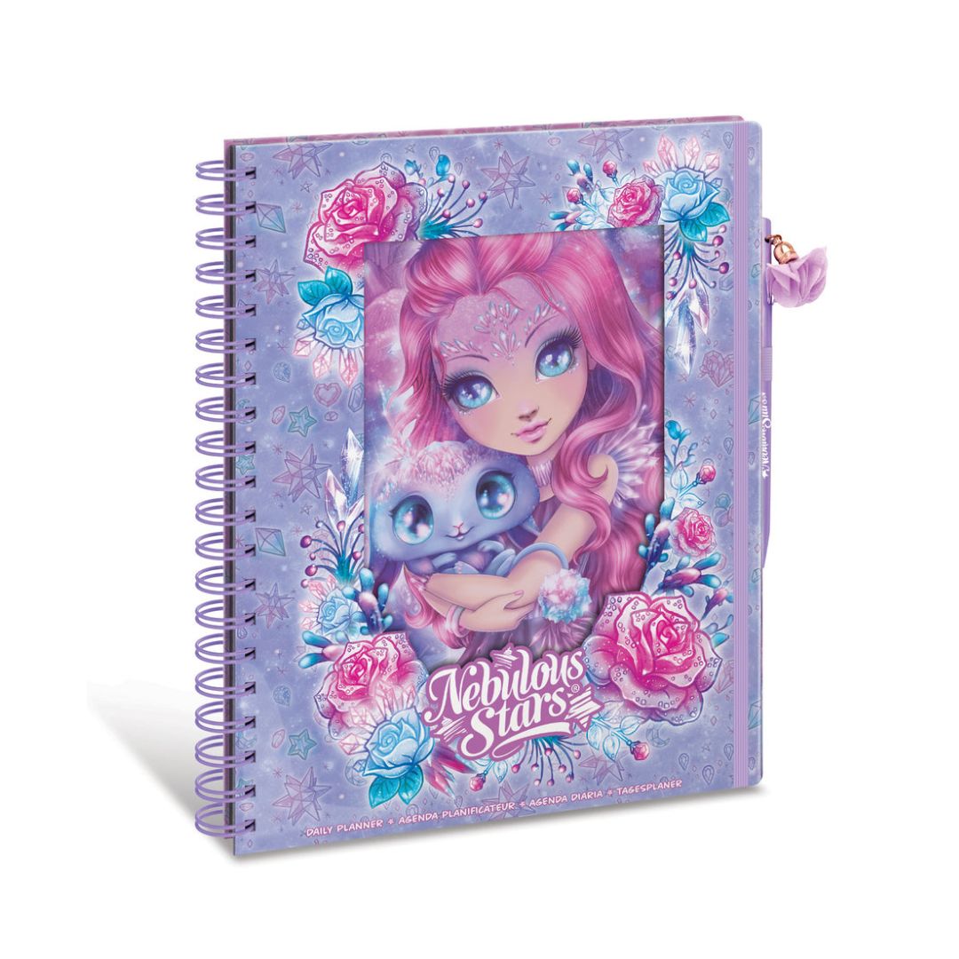 A spiral-bound notebook with a lavender cover featuring an illustration of a pink-haired girl holding a blue creature, surrounded by pink and blue flowers. The cover reads 'Fabled Stars' and is shown on a white background.