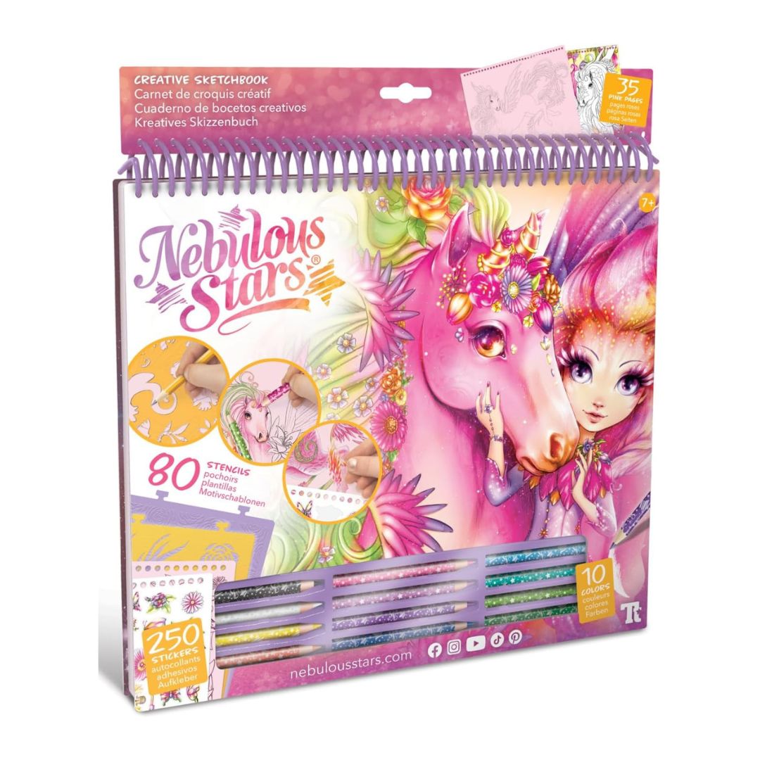 Nebilous Stars Creative Sketchbook set with a pink and purple illustrated cover, spiral binding, and included colored pencils and stickers, shown on a plain white background.