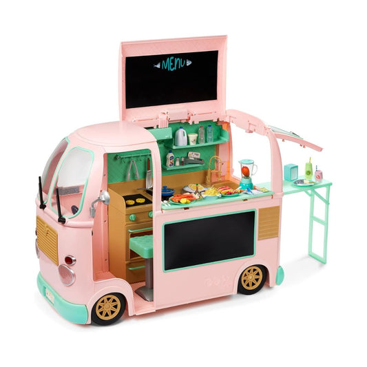 A pink toy food truck playset with an open back and side serving window, showing a mint green kitchen interior, small food items, and a matching mint green side table on a white background.