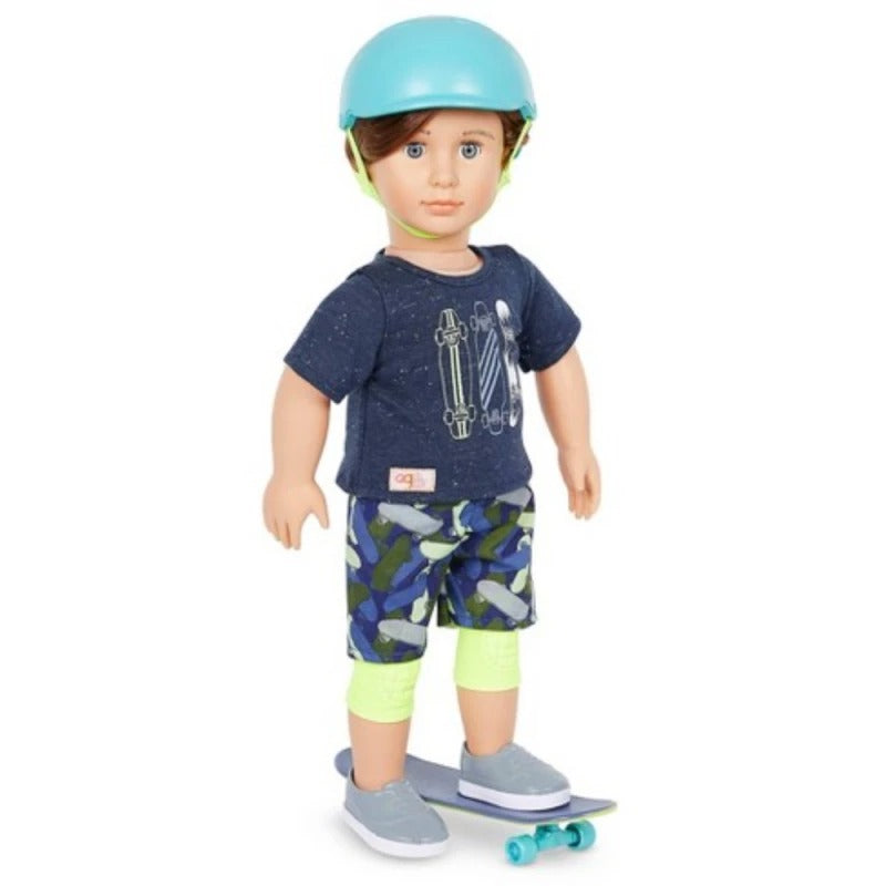 A doll dressed in a navy blue t-shirt with a skateboard graphic, blue and green camouflage shorts, neon yellow leg warmers, a light blue helmet, and gray slip-on shoes, standing on a small skateboard against a white background.
