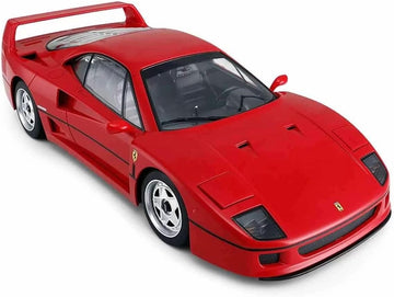 Red Ferrari model car on a white background