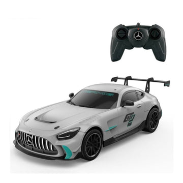 A silver Mercedes-Benz GT-R style remote control toy car with black wheels and teal accents, shown with a black remote control controller above it on a white background.