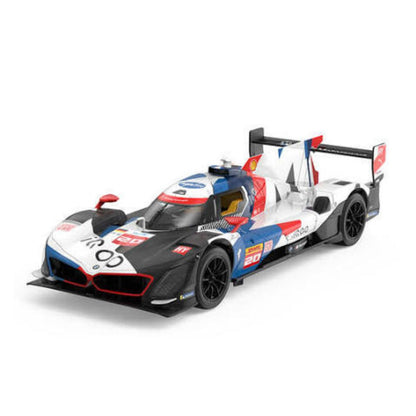 A scale model of a Toyota hybrid sports car race car, featuring a white, blue, and red livery with the number 95, shown on a clean white background.