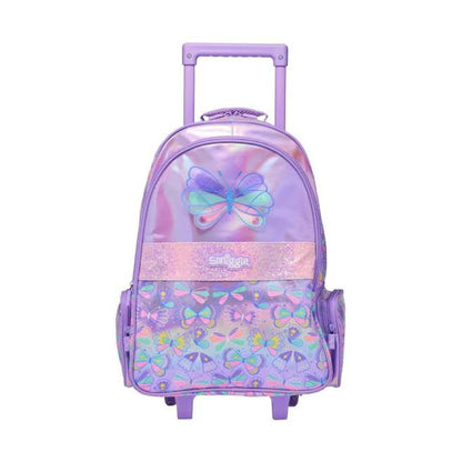 A purple rolling backpack with a butterfly design, featuring a transparent iridescent upper section, a glittery pink band with the brand name 'Smilez' in the center, and a patterned lower section with multiple butterflies. It has a telescoping handle and two wheels.