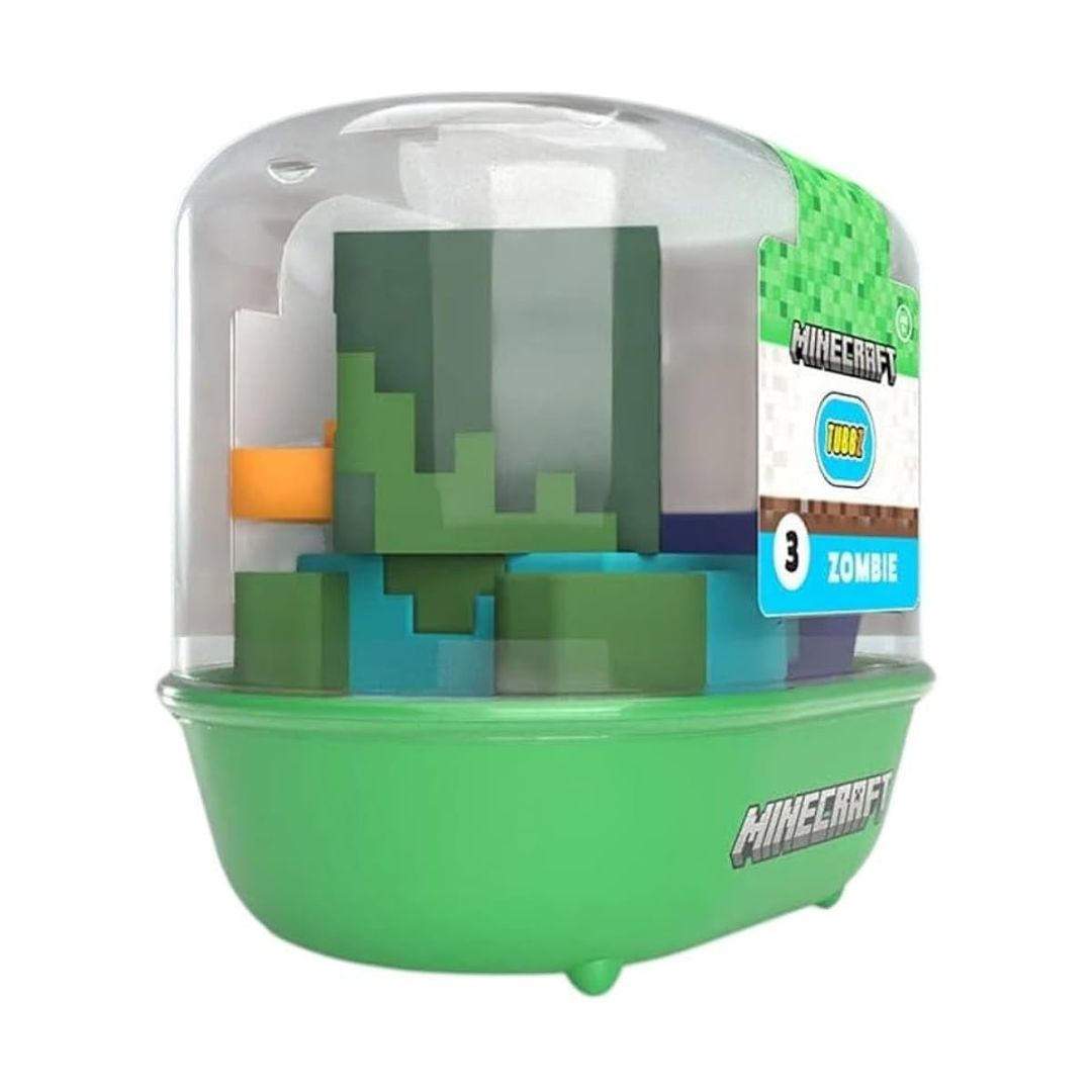 Minecraft Zombie toy figure in a clear dome container with a green base, shown on a white background. The packaging label reads Minecraft, Year 3, and Zombie.